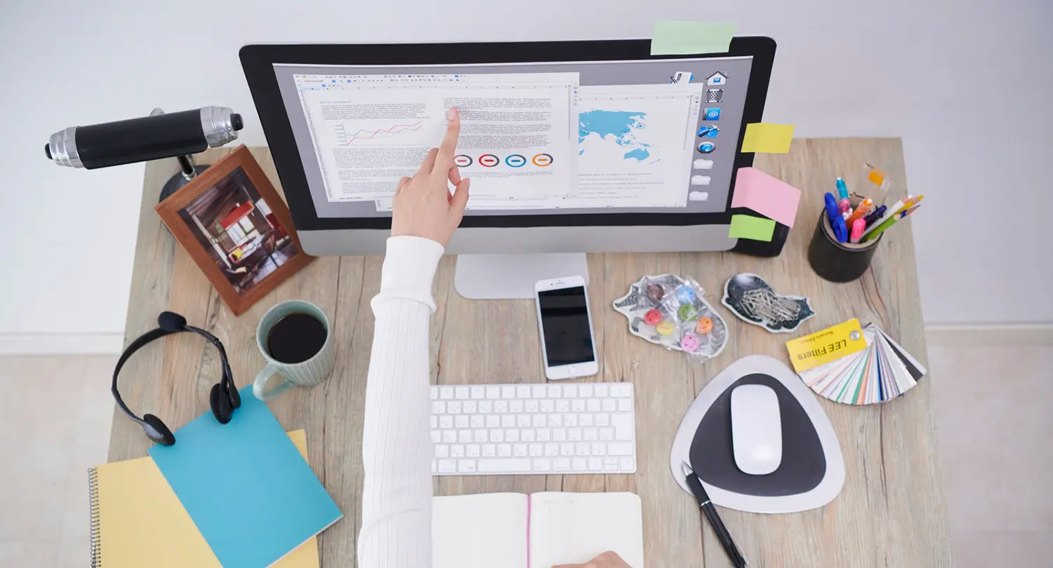 Photo of a woman working at a desk